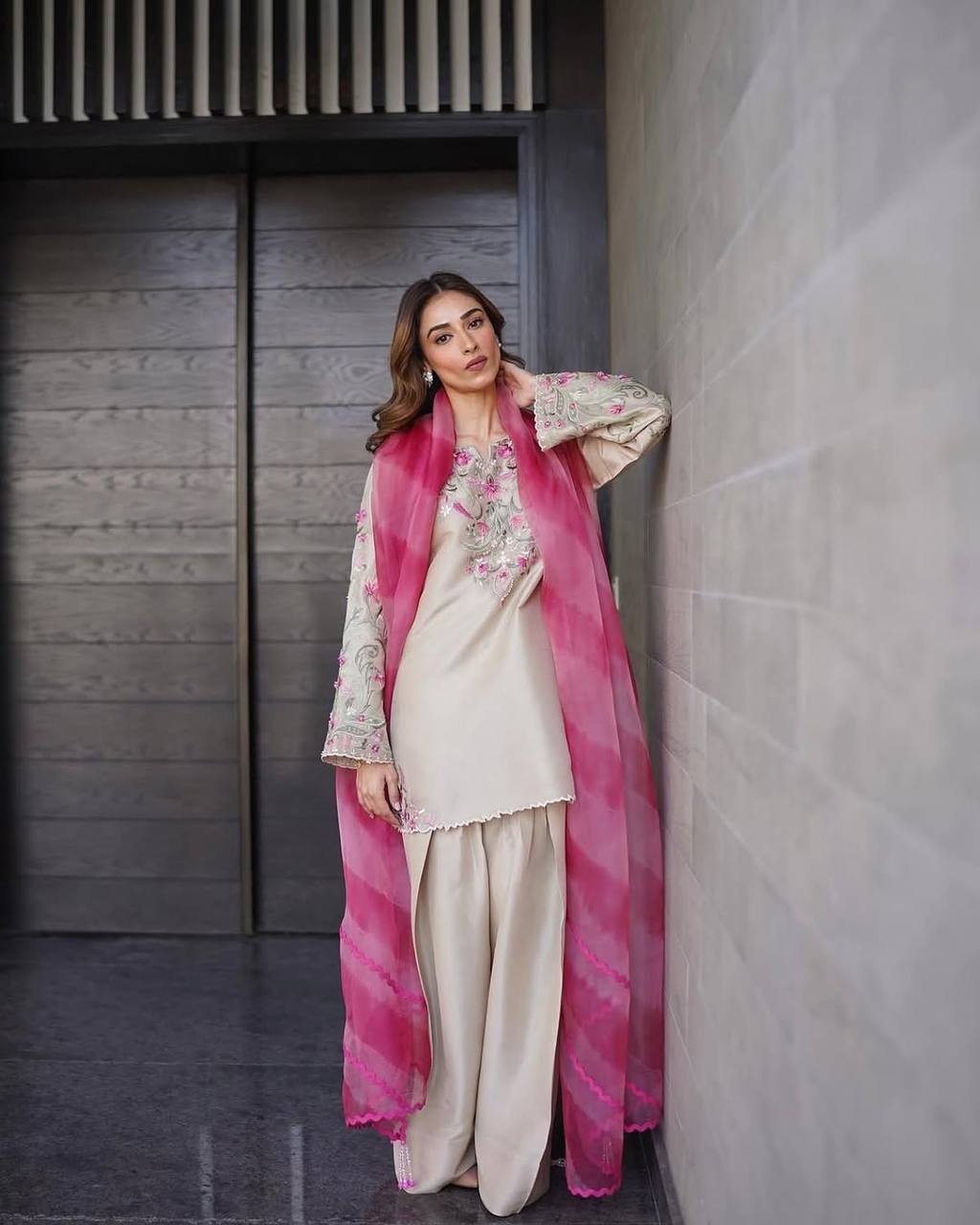 French crepe Farsi salwar suit with organza dupatta – front view, Designer embroidered French crepe top, Soft printed organza dupatta with lace and tassels, Fully stitched French crepe salwar suit, Elegant salwar suit for festive wear, Premium French crepe suit set for women, Party wear salwar suit with organza dupatta, Wedding guest salwar suit in French crepe