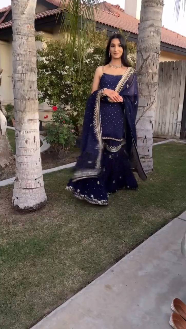 Faux Georgette sharara set, Thread work sharara suit, Sequin work sharara set, Georgette sharara with dupatta, Sharara set for festive wear, Indian party wear sharara suit, Fully stitched sharara set, Ethnic sharara suit for women, Designer sharara with lace dupatta, Sharara kurta dupatta set, Faux Georgette festive outfit, Wedding wear sharara suit, Rakhi sharara suit set, Raksha Bandhan outfit for women, Embroidered sharara set, Ready to wear sharara suit, Thread embroidery and sequin sharara, Indian ethn
