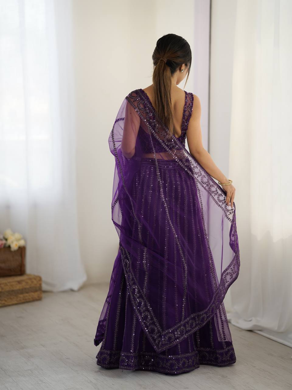 Party Wear Purple Soft Net Lehanga With  Sequins And Dori Embroidery
